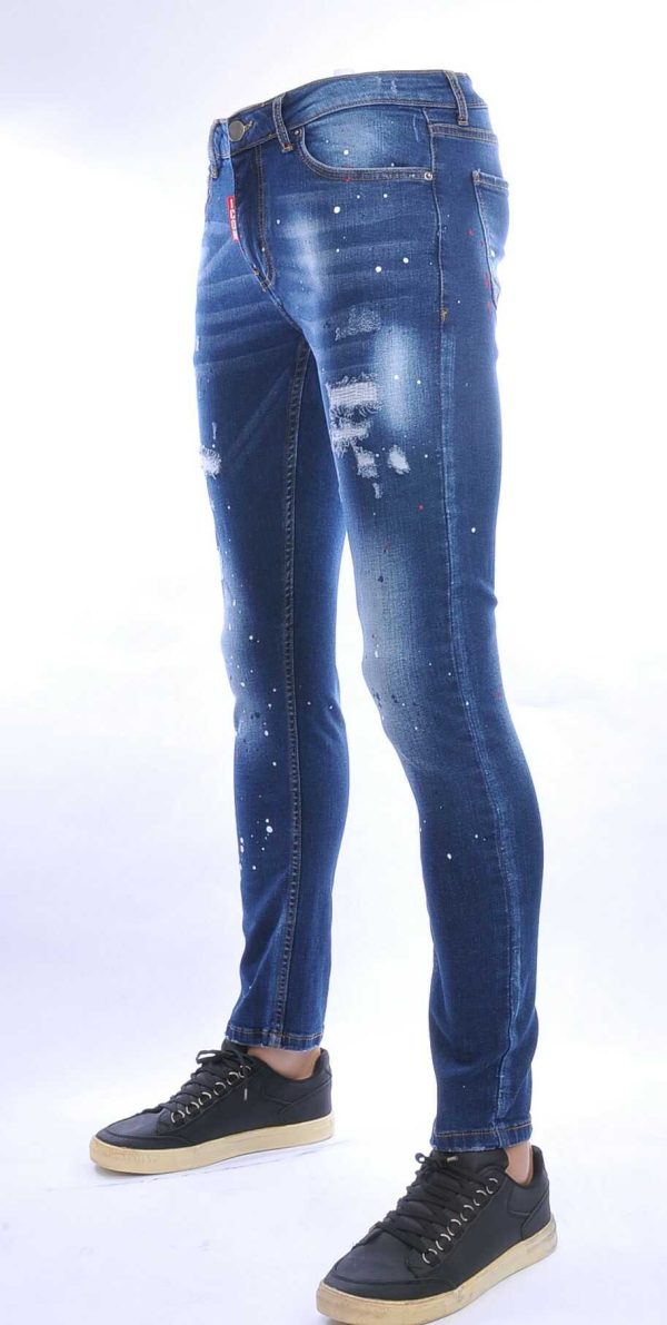 ICON gescheurde slim fit stretch heren jeans met verfspatten Blauw