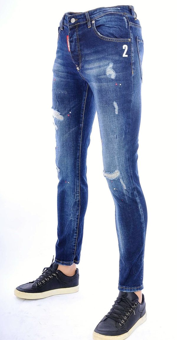 ICON2 A Fish Named Fred Wolff Blitz Louis Vuitton GUCCI VERSACE KENZO Dsquared2 Levi's CHASIN G-STAR DOLCE & GABBANA DIESEL PME LEGEND WAM DENIM LACOSTE trendy gescheurde slim fit jeans met verfspatten Blauw
