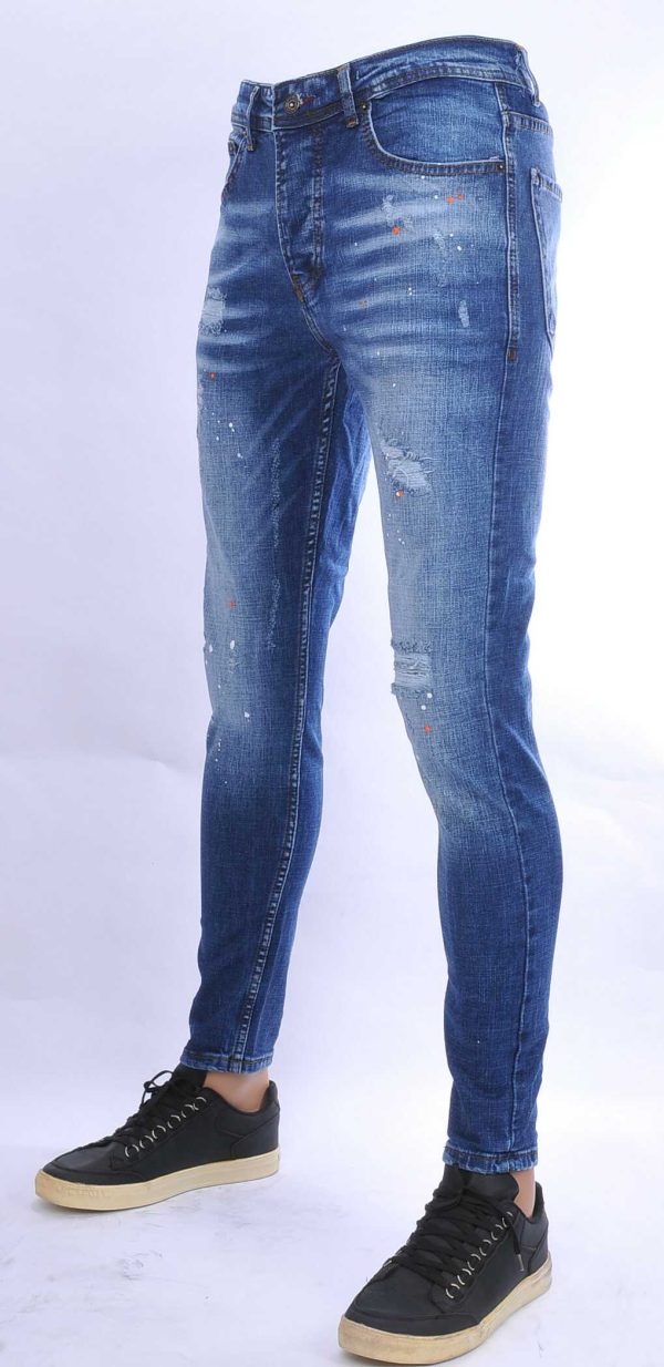 VALENCI hippie gescheurde slim fit stretch heren jeans met verfspatten Blauw