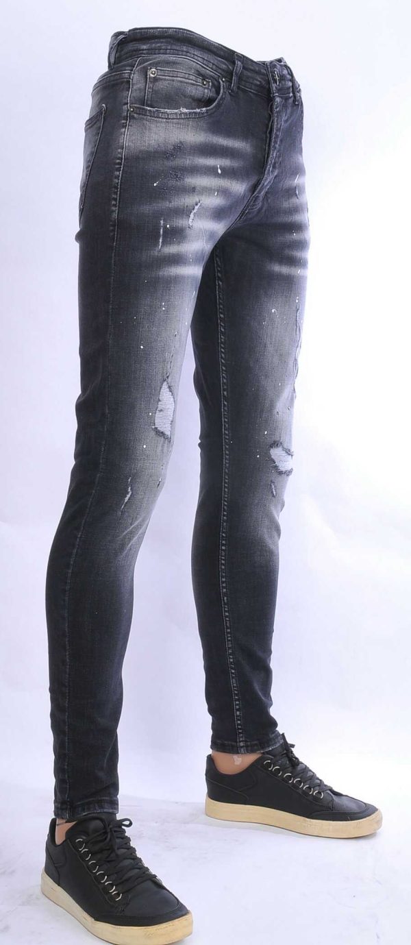 VALENCI hippie gescheurde slim fit stretch heren jeans met verfspatten Zwart