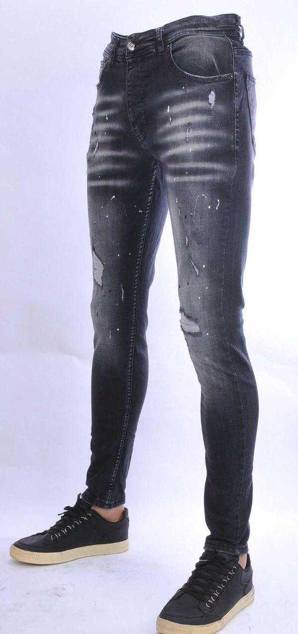 VALENCI hippie gescheurde slim fit stretch heren jeans met verfspatten Zwart