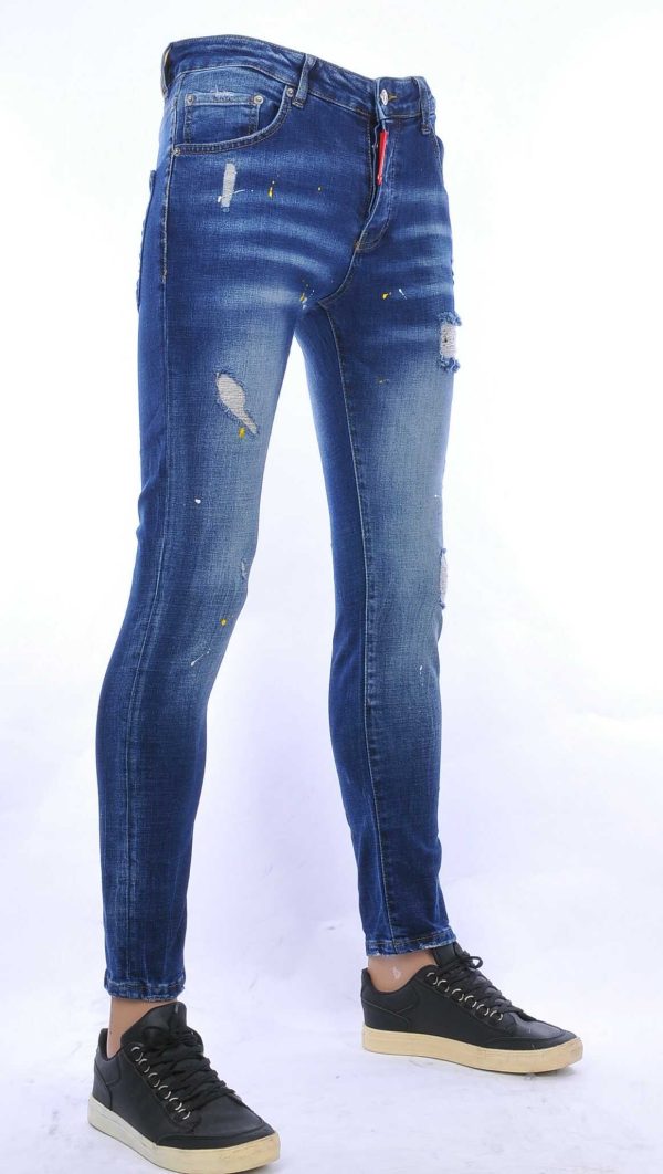ICON2 A Fish Named Fred Wolff Blitz Louis Vuitton GUCCI VERSACE KENZO Dsquared2 Levi's CHASIN G-STAR DOLCE & GABBANA DIESEL PME LEGEND WAM DENIM LACOSTE hippie gescheurde slim fit heren jeans met verfvlekjes Blauw