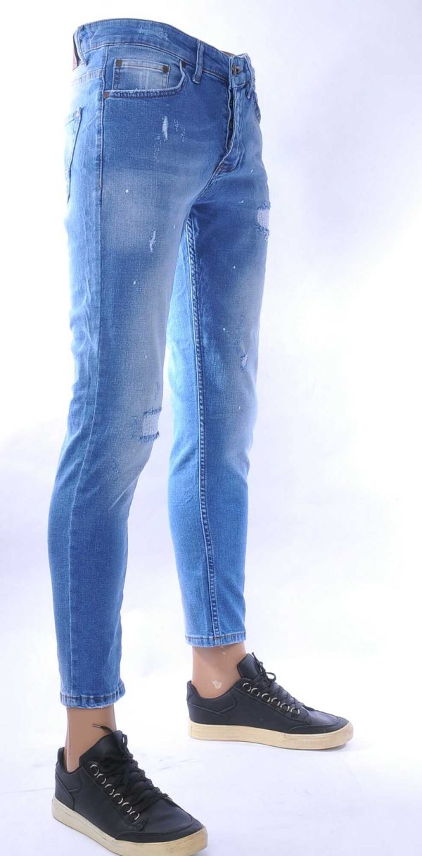 MONTFLEURI hippie gescheurde slim fit stretch heren jeans met verfspatten Lichtblauw